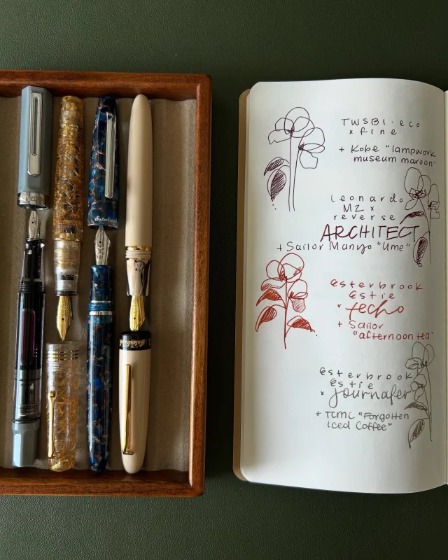 Hi friends, hope you’re having a good day! In today’s livestream, we chatted about fountain pens, inks, nibs, and pen shows… I also created Currently Inked and Notably Inked spreads using my fountain pens. Replay is up on YT 🫶🏽  Here are my Notably Inked 🖋️ in April:
1. TWSBI eco (f) + Kobe “lampwork museum maroon”
2. Leonardo MZ x Stilo & Stile (reverse architect) + Sailor Manyo “Ume”
3. Esterbrook Estie (Techo) + Sailor “afternoon tea”
4. Esterbrook x TheCoffeeMonsterzCo Estie (journaler) + TCMC “Forgotten Iced Coffee”
5. Pilot Custom 823 (signature) + Diamine “twilight”
6. Esterbrook Estie (broad journaler) + Dominant Industry x Wonder Pens “tuna and olives”
7. Franklin-Christoph 46 (medium Cursive Italic) + Dominant Industry x WP “chicken in the sky with diamonds”
8. Esterbrook Estie (broad SIG) + Bungabox “tears of alice”  🖋️Notably inked = every month, I choose a number of pens based on model, nib, and matching inks specifically to explore and have fun with while journaling. They’re notable because this lineup may change the next month, while my core lineup of currently inked pens stays consistently the same month-over-month.  #fountainpen #esterbrook #thecoffeemonsterzco #twsbi #leonardopen #franklinchristoph #fountainpenart
