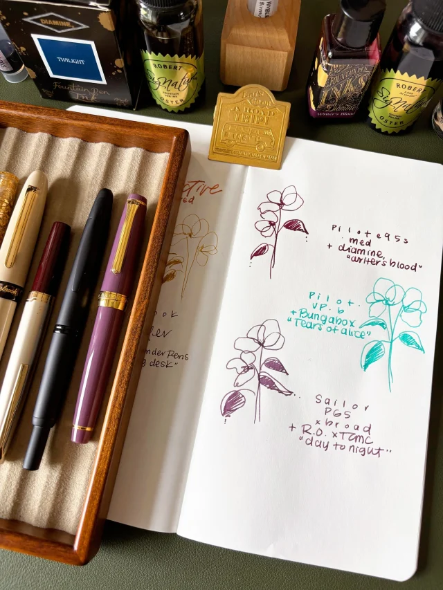 In today’s livestream, I created June Currently Inked and Notably Inked spreads using my fountain pens.  I also mentioned my online workshop for the upcoming Adventurous Artist Summit (June 25-26th). I’m so honoured to be a part of such a talented group of artists who share their creative process - and it’s free to attend online! Ticket to join is in my bio.  Here are my Notably Inked 🖋️ in June:  1. Skogsy Cholla (perspective by Gena) + Birmingham Pen Co “Ambered Adobe”
2. Leonardo MKZ (reverse architect by Gena) + Robert Oster “honey bee”
3. Esterbrook x TheCoffeeMonsterzCo Estie (journaler by Gena) + Ferris Wheel Press x Wonder Pens “Writing Desk”
4. Pilot E95S (medium) + Diamine “writer’s blood”
5. Pilot VP (broad) + Bungabox “tears of alice”
6. Sailor Pro Gear Slim (broad) + Robert Oster x TCMC “day to night”  Replay is up for watching - thanks, friends 🫶🏽  #fountainpens #fountainpenink #fountainpenlove #fountainpendrawing